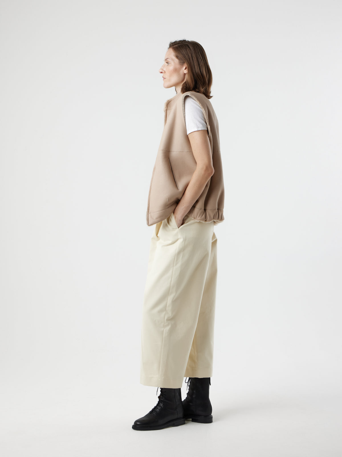 side view of woman wearing Joyce Cream Shearling Gilet by Gushlow and Cole
