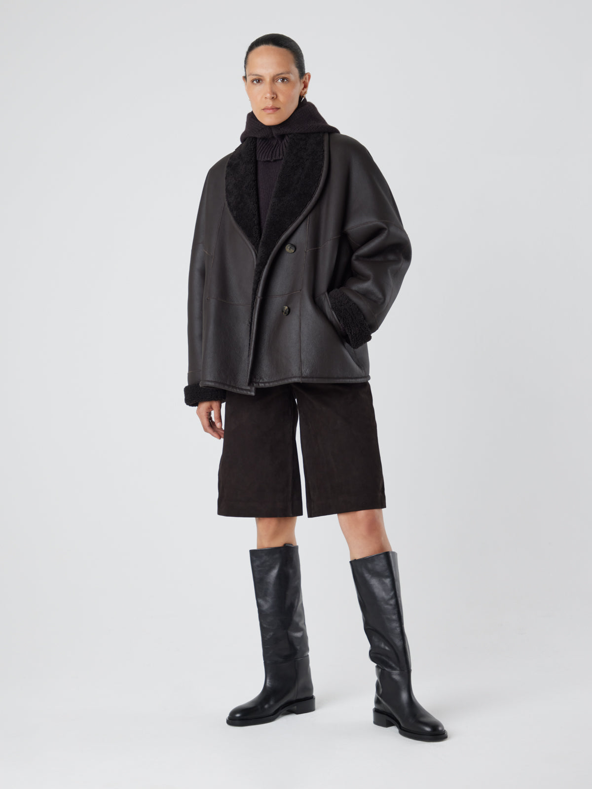 L9020 Brown Midi Shearling Coat | Womens | Gushlow & Cole-model with hand in pocket
