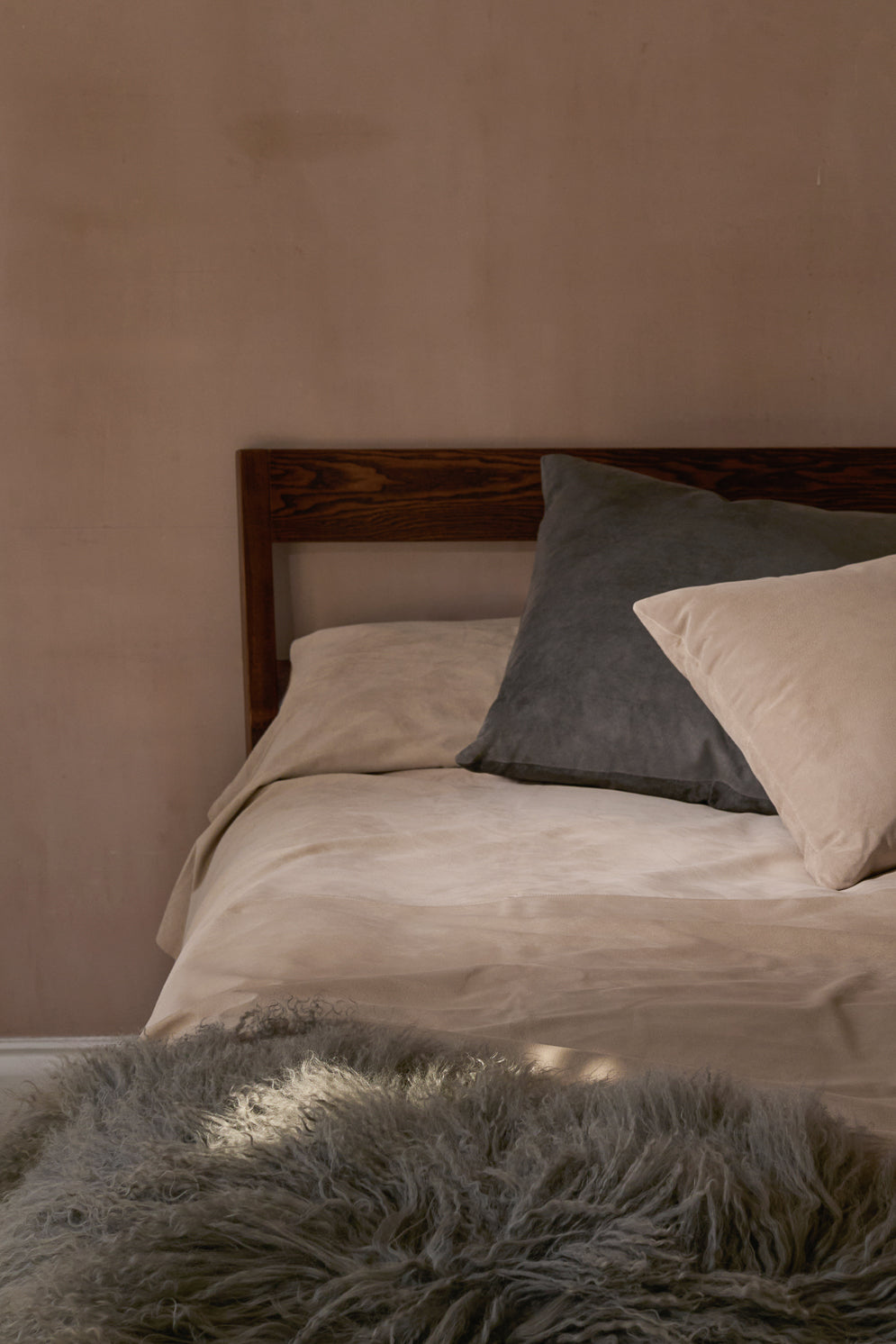 Large Grey Mongolian Shearling Throw | Home | Gushlow & Cole - cut out image of throw on bed