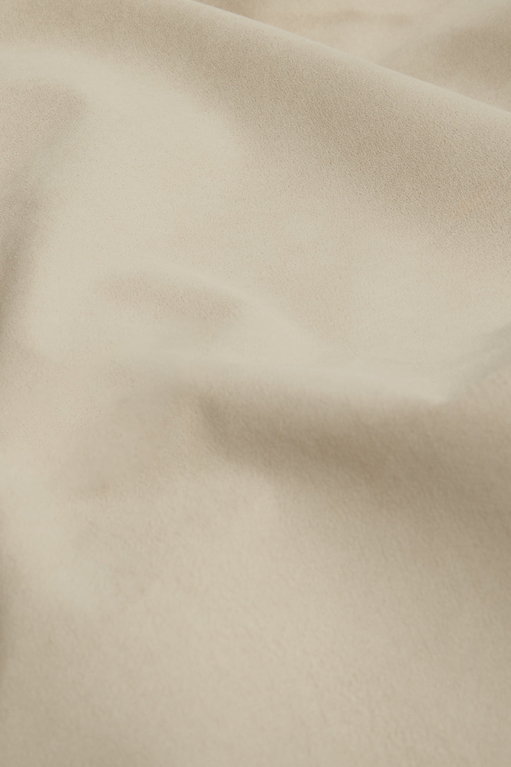 Large Stone White Suede Throw | Home | Gushlow & Cole - lifestyle shot close up of suede throw