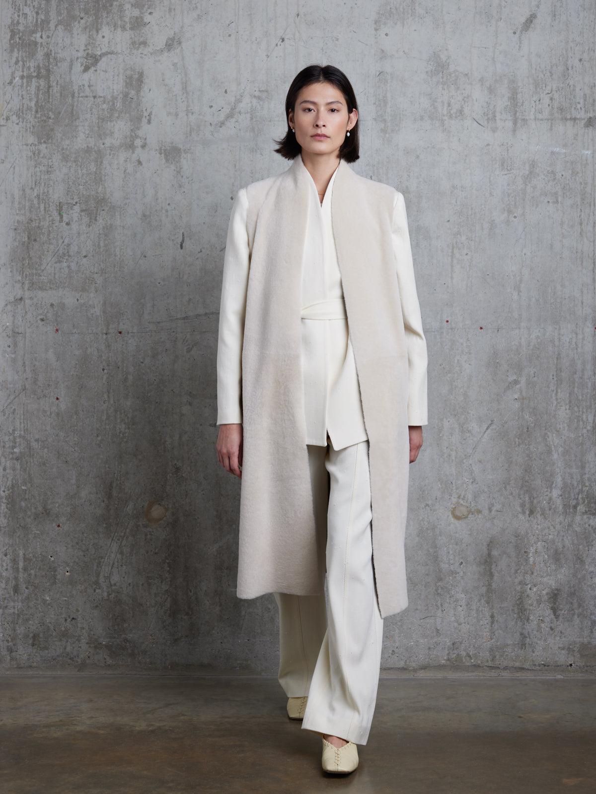 Longline Stand Collar White Shearling Gilet | Womens | Gushlow & Cole - model full length front walking