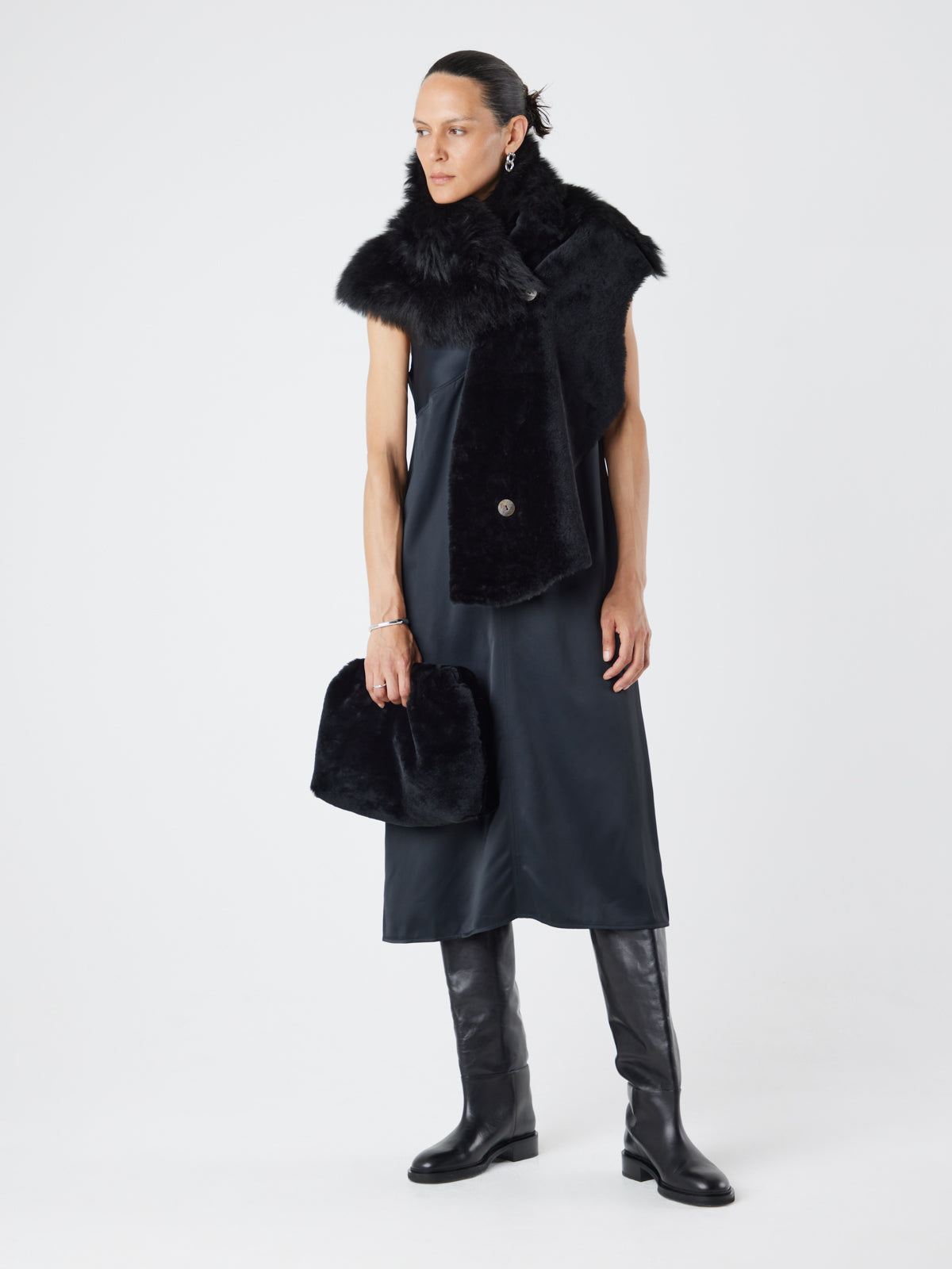 Merino Soft Black Shearling Clutch Bag | Womens | Gushlow & Cole - model full length holding bag
