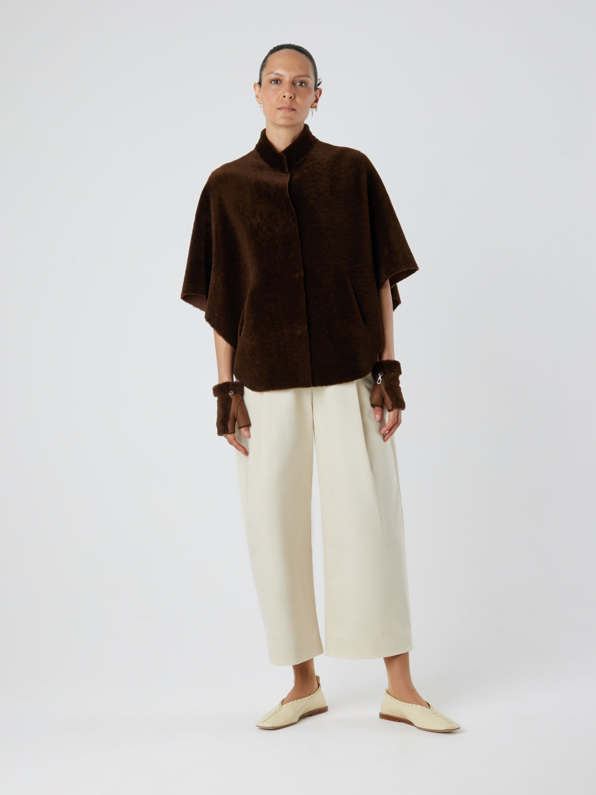 Mini Chestnut Brown Shearling Mittens | Womens | Gushlow & Cole- model with mittens and cape