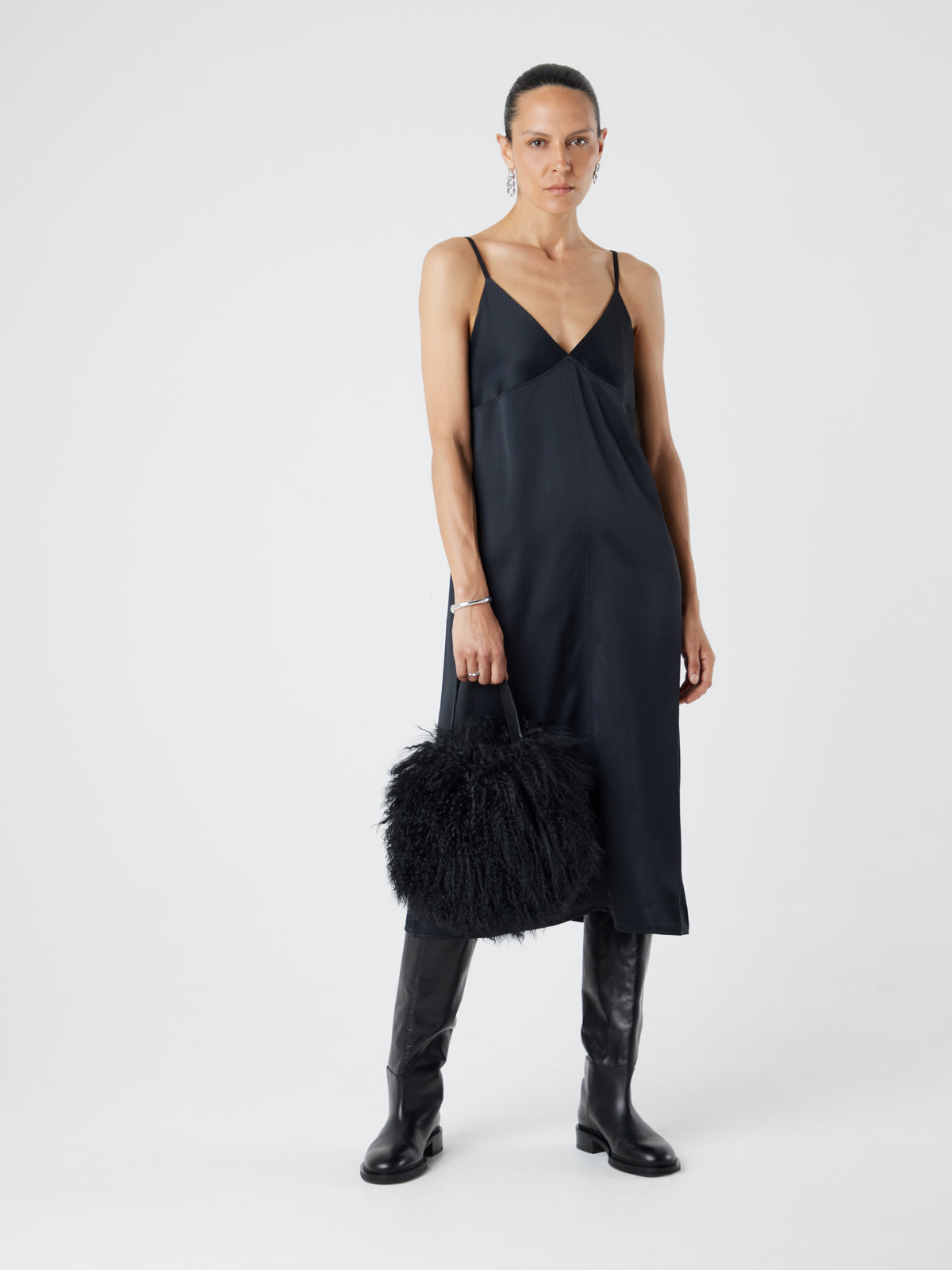 Mongolian Shearling Black Saddle Bag | Womens | Gushlow & Cole-model with bag down