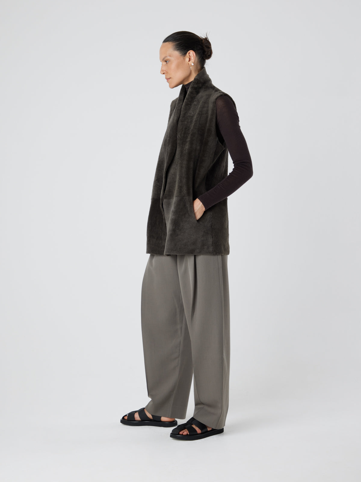 Natural Edge Storm Green Mid Length Shearling Gilet - model full length side wool out