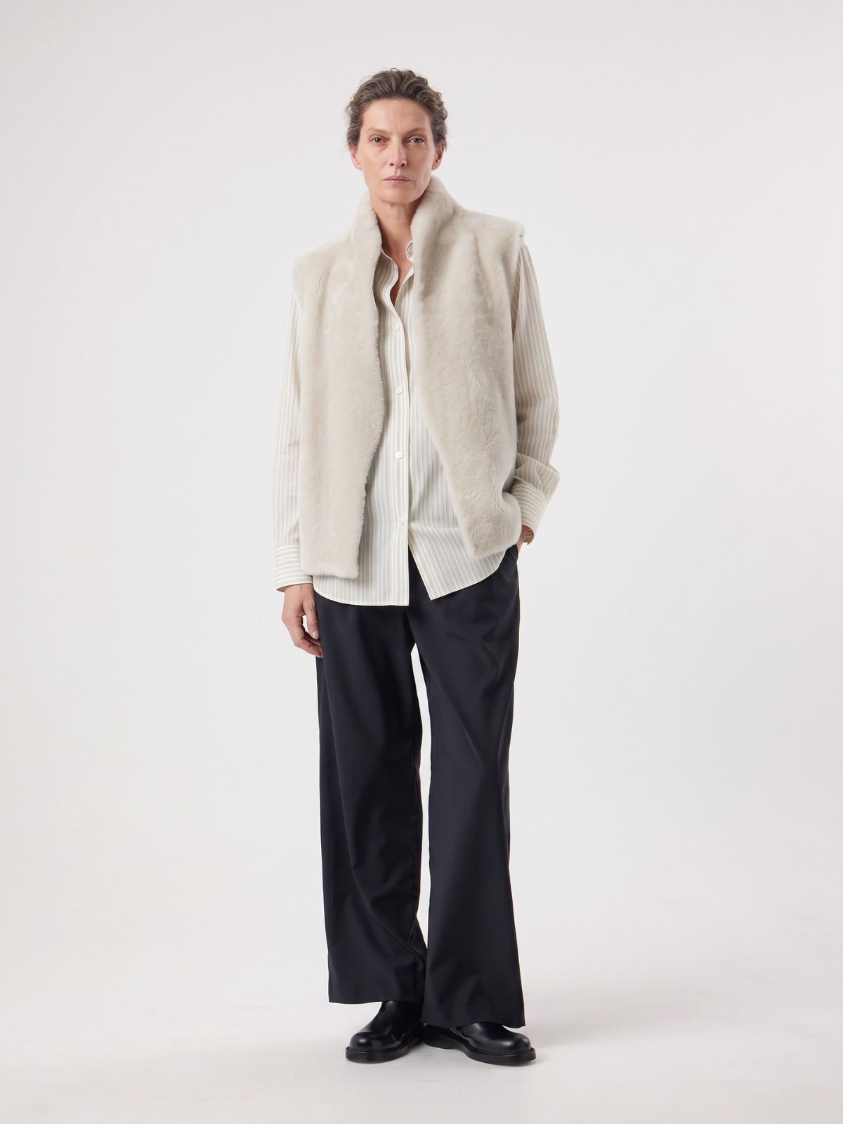 woman wearing Natural Edge White Shearling Gilet by gushlow and cole