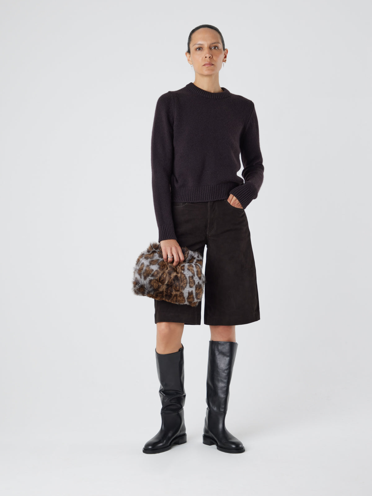 Ocelot Print Soft Shearling Clutch Bag | Womens | Gushlow & Cole - model holding bag down full length