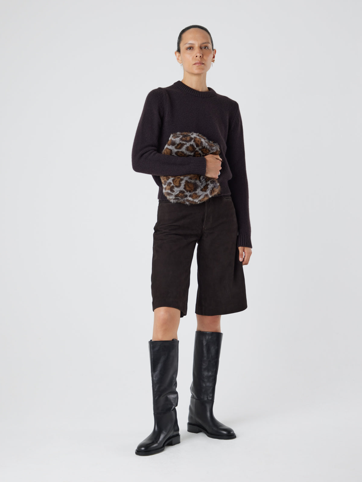 Ocelot Print Soft Shearling Clutch Bag | Womens | Gushlow & Cole - model holding bag full length