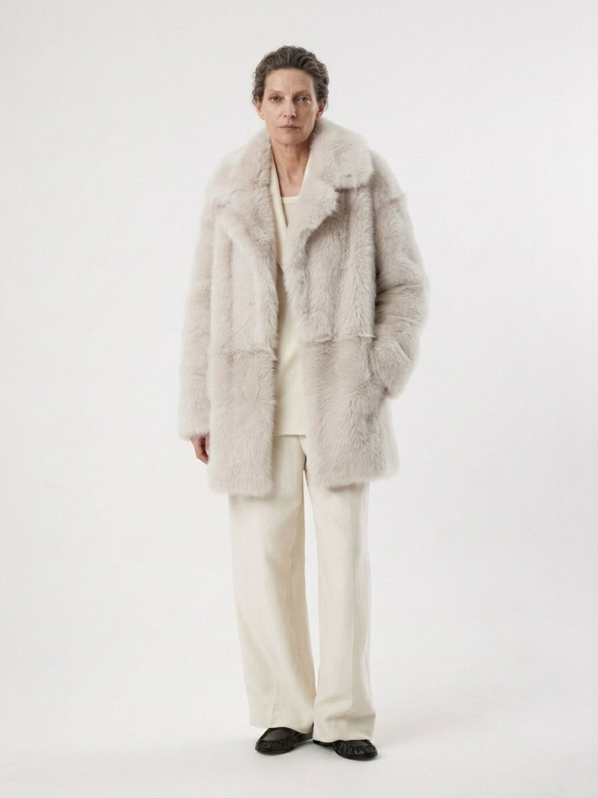 woman wearing relaxed fit white toscana shearling coat by gushlow & cole
