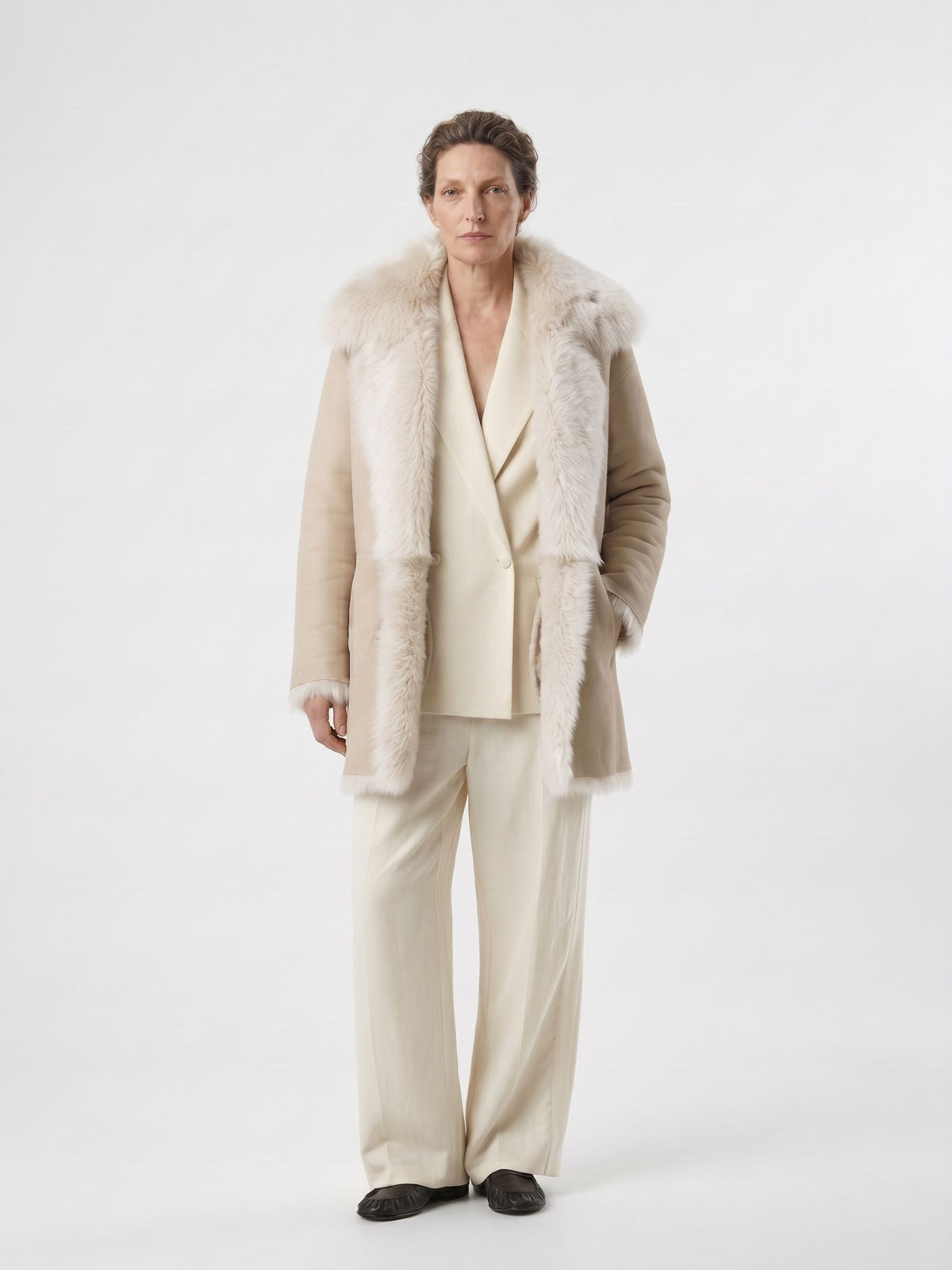 woman wearing relaxed fit white toscana shearling coat by gushlow & cole