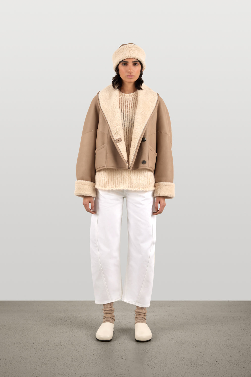 Stone White Chiswick Shearling Hat | Womens Luxury Shearling | Gushlow & Cole | model front with jacket