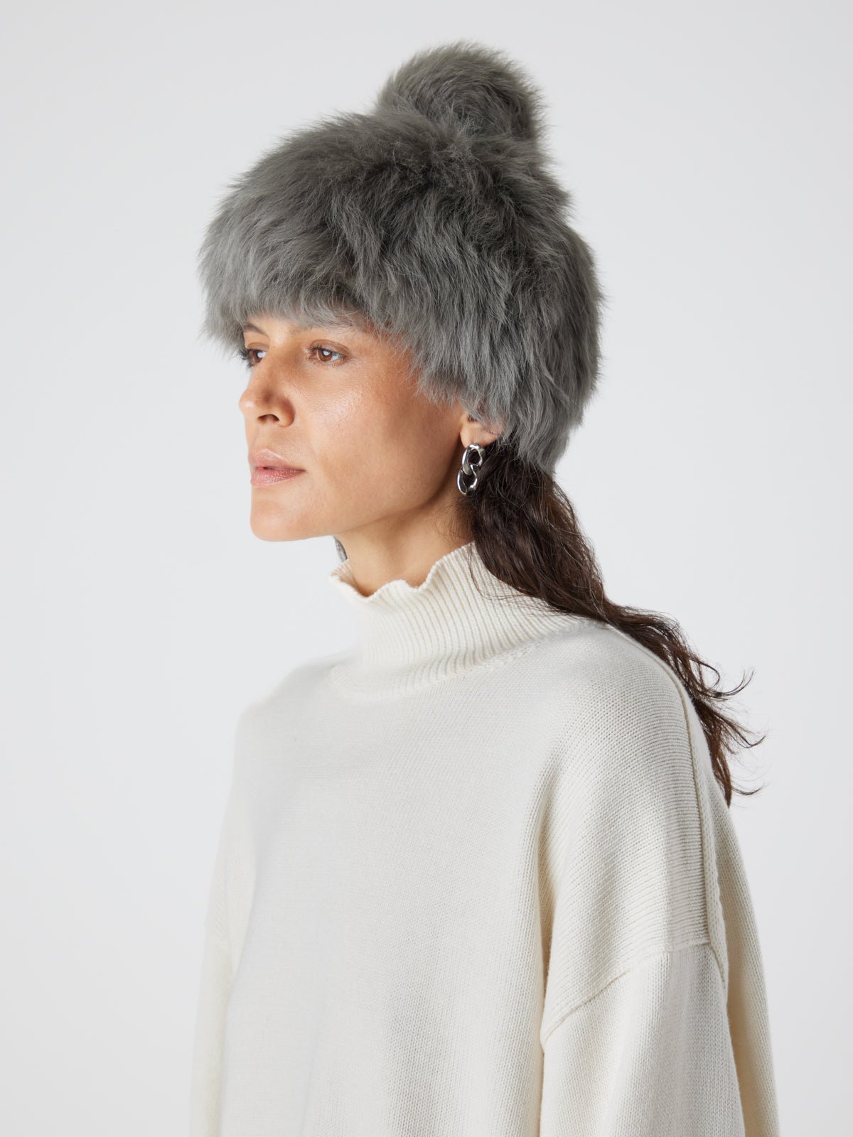 Storm Green Shearling Bobble Hat | Womens | Gushlow & Cole - model wearing hat