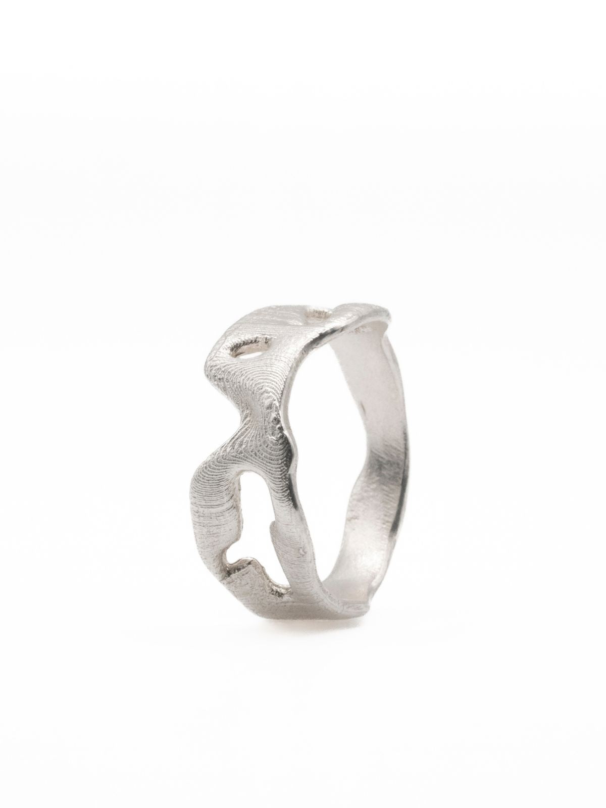 sterling silver warp ring by studio agaea on white background