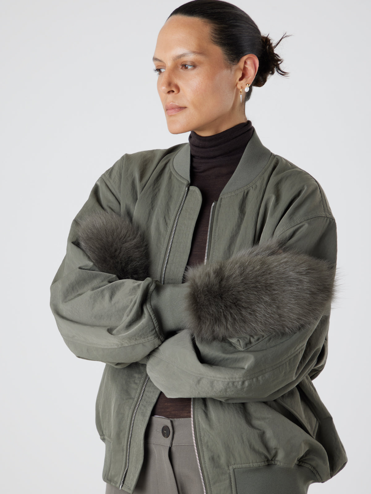 Ultimate Storm Green Touchscreen Shearling Mittens | Womens | Gushlow & Cole-model wearing mittens
