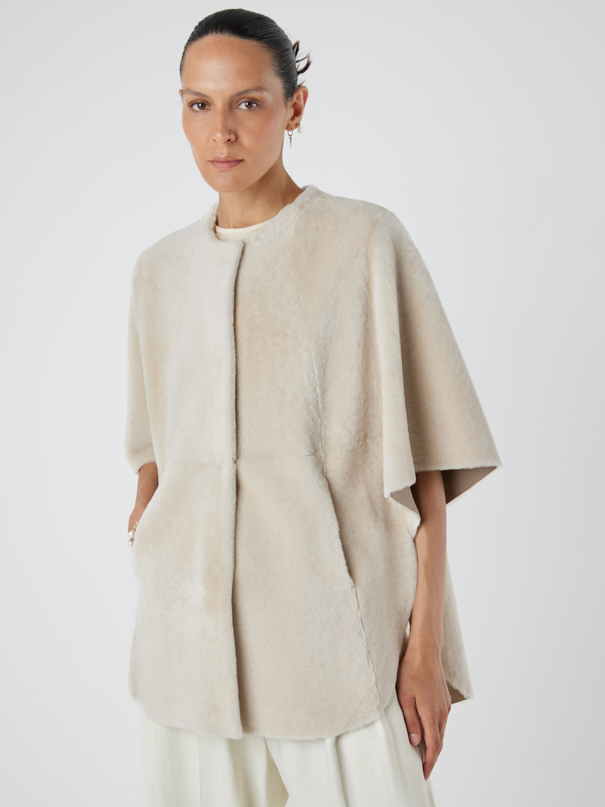 White Collarless Shearling Cape | Womens | Gushlow & Cole- model crop front