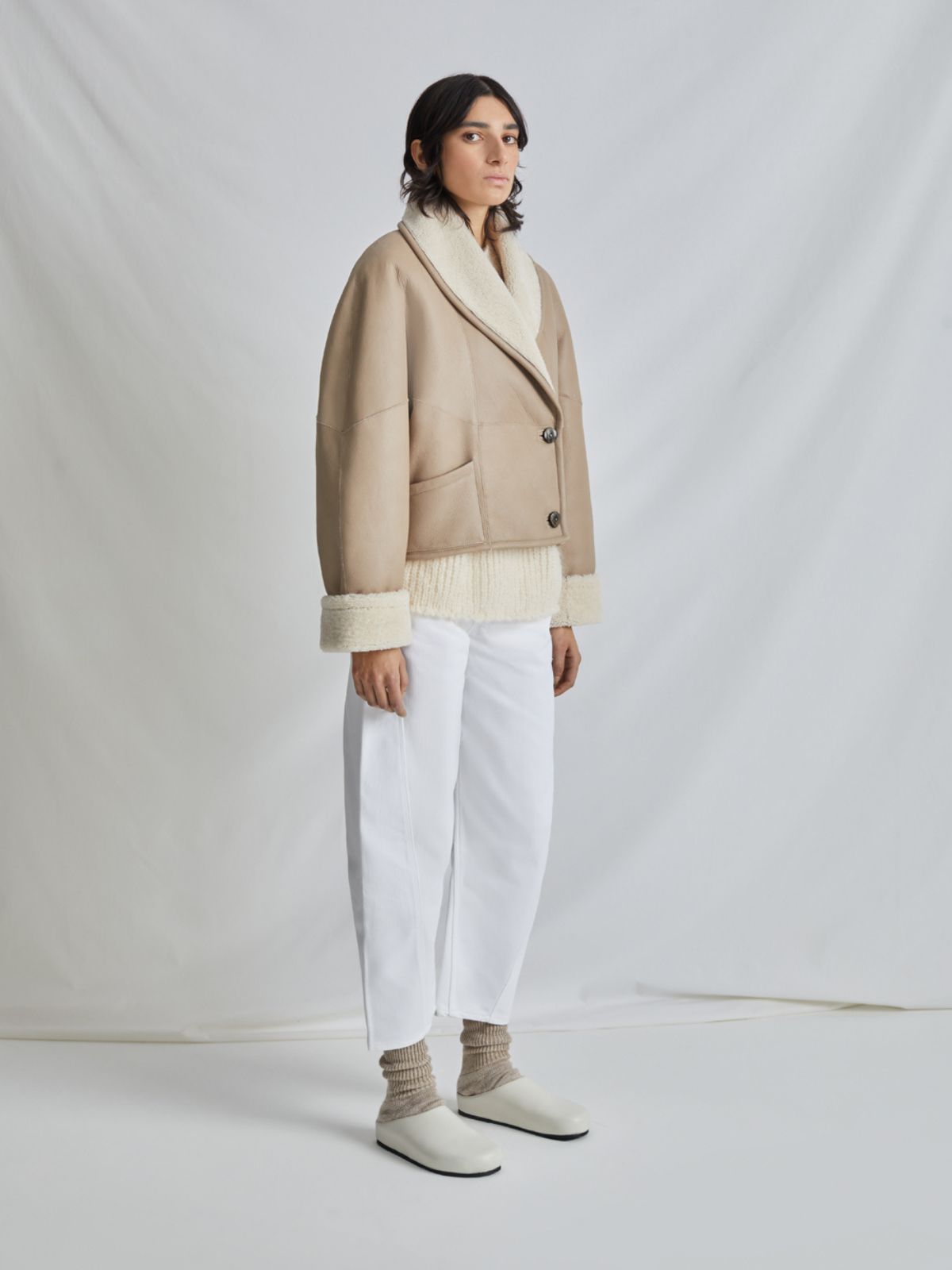 side view of woman wearing White L9020 Crop Shearling Jacket by Gushlow & Cole