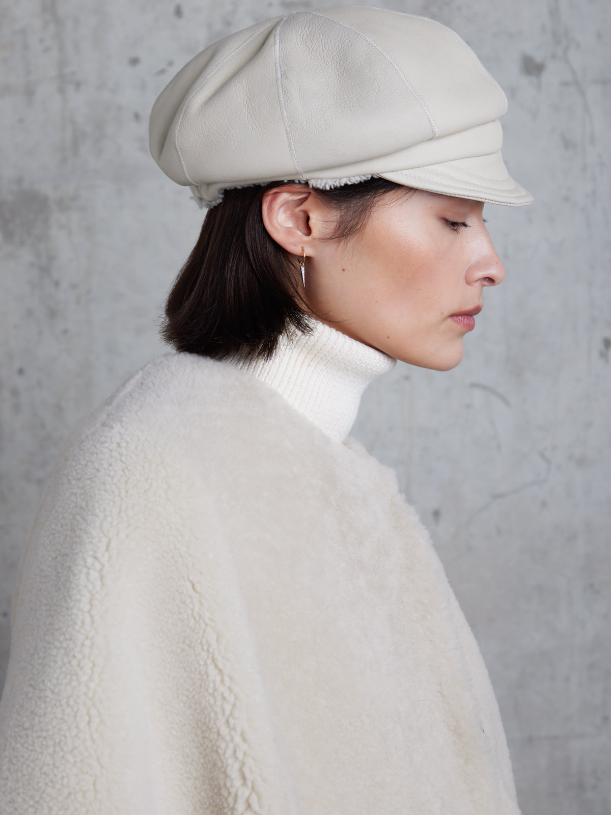 White Shearling Carnaby Cap | Women | Gushlow & Cole - model crop side
