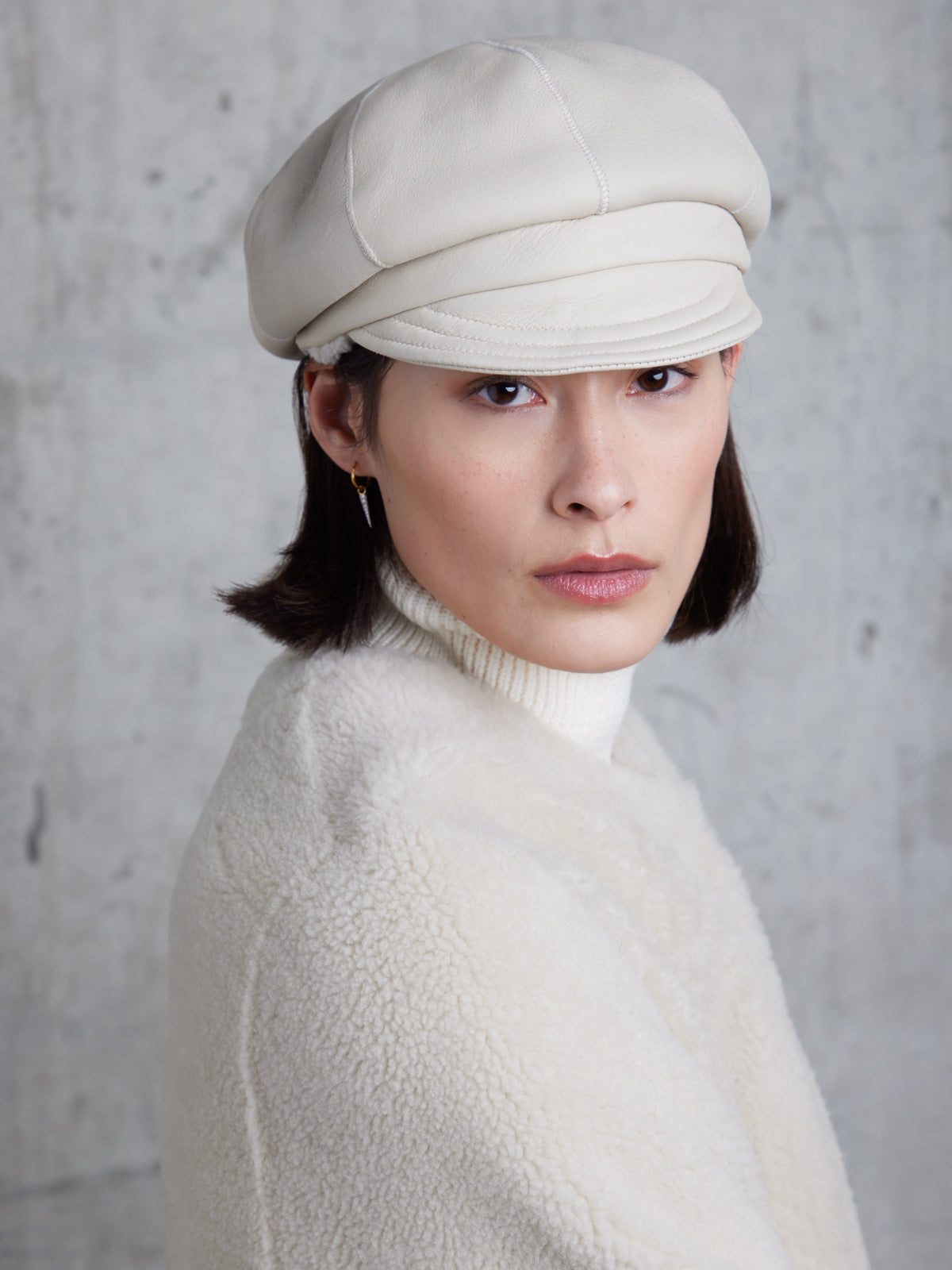 White Shearling Carnaby Cap | Women | Gushlow & Cole - model crop front