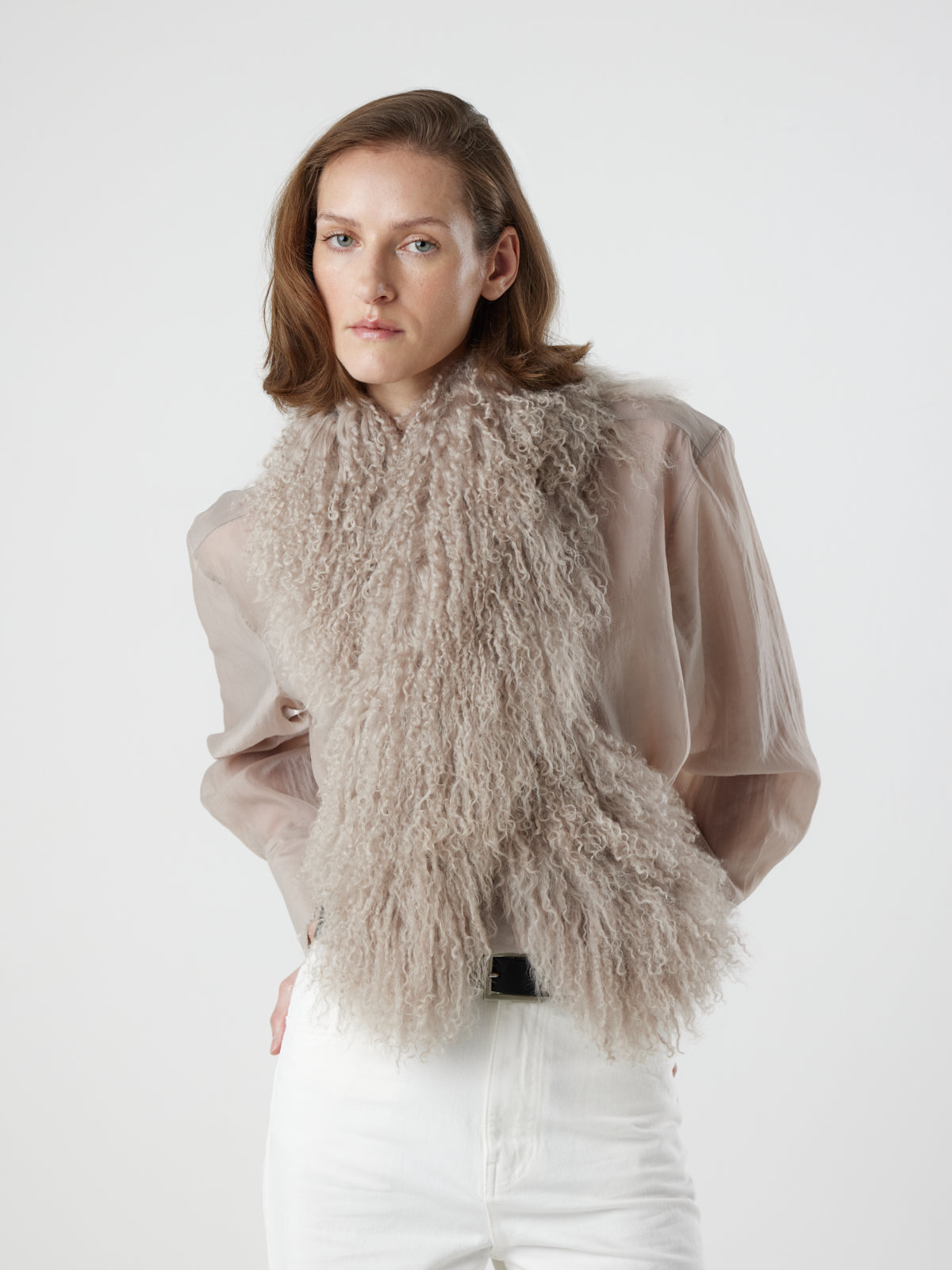 woman wearing oyster White Mongolian Shearling Shawl Scarf styled crossed over by gushlow & cole. sheepskin Shawl Scarf