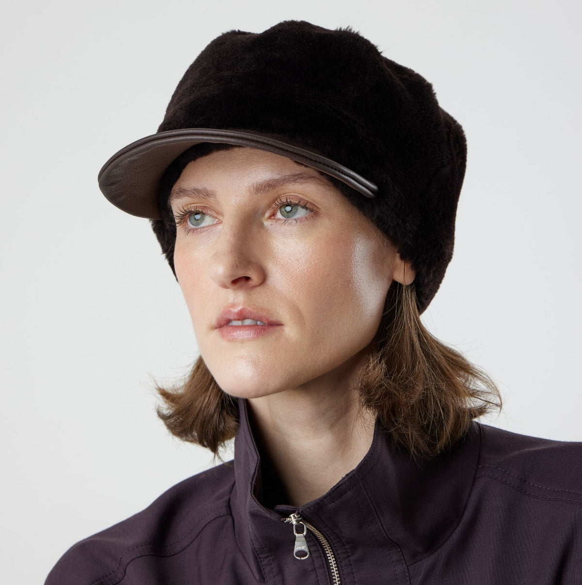 woman wearing brown shearling cap by gushlow & cole