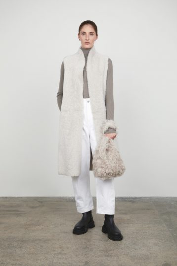 White Stand Collar Long Shearling Gilet gushlow and cole womens shearling model full length front with bag