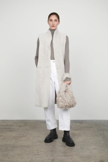 White Stand Collar Long Shearling Gilet gushlow and cole womens shearling model full length front with bag