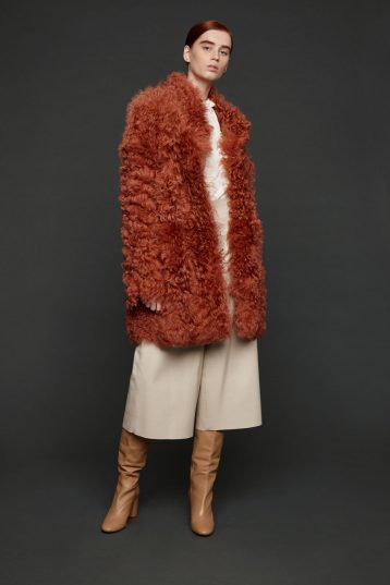 curly shearling coat in canteloupe orange | Women | Gushlow & Cole