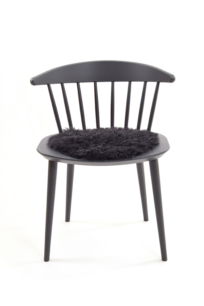 Curly Sheepskin Seat Pad in Dark Grey chair