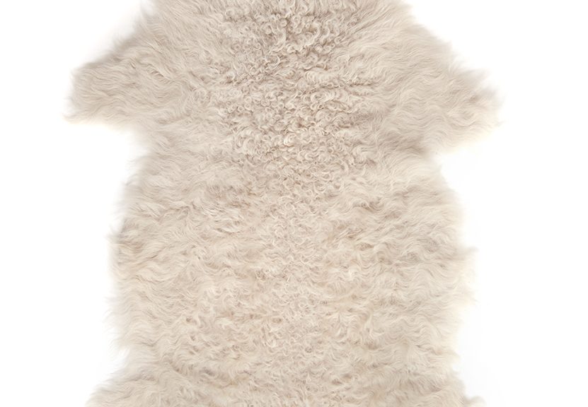 Small Curly Toscana Sheepskin Rug in Beige | Homewear | Gushlow & Cole cut out