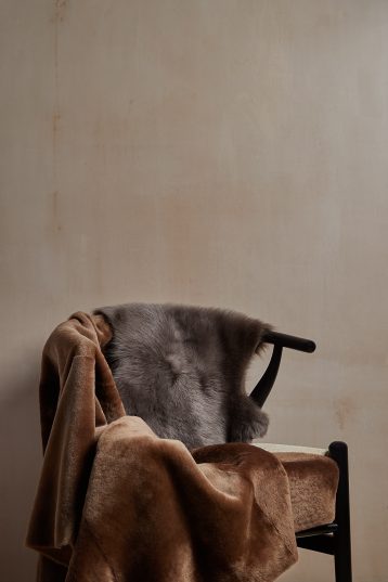Double Toscana Sheepskin Rug in taupe with camel throw gushlow and cole homeware lifestyle