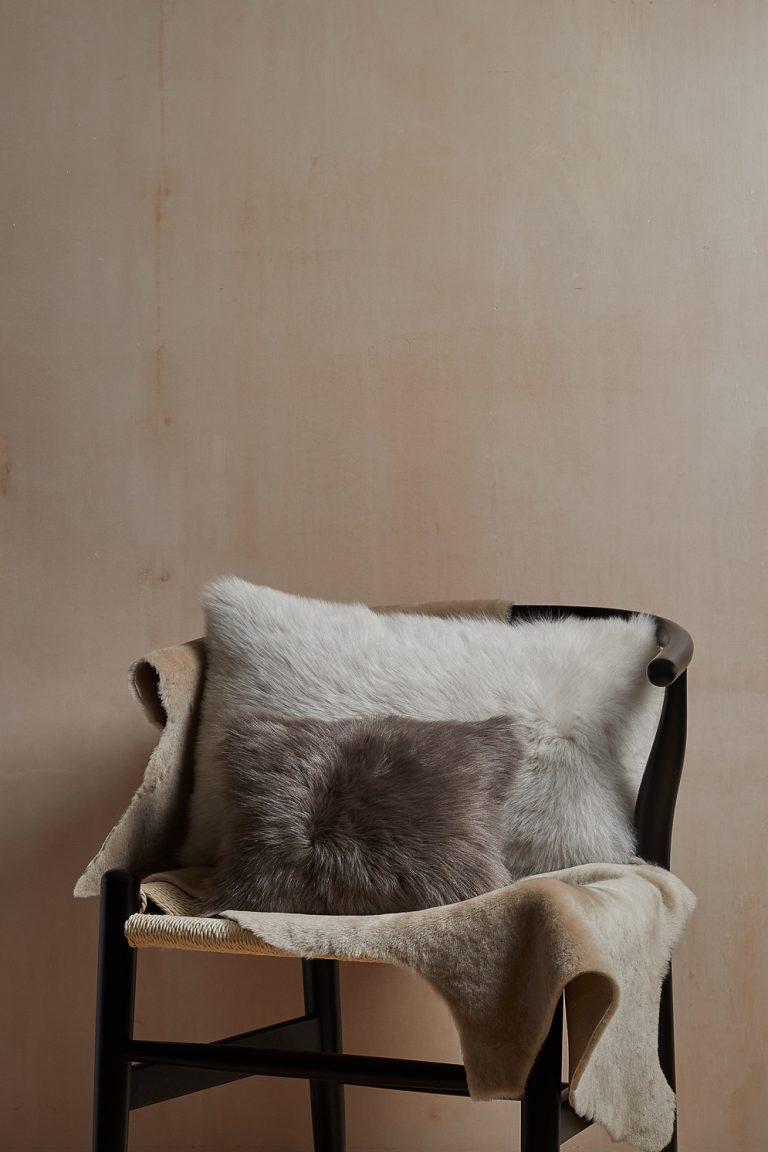 Large and mini Toscana Sheepskin Cushion in white and taupe homeware gushlow and cole lifestyle