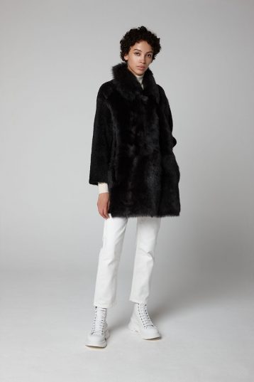 Black Relaxed Fit Mixed Shearling Taper Coat - model full length wool out - women | Gushlow & Cole