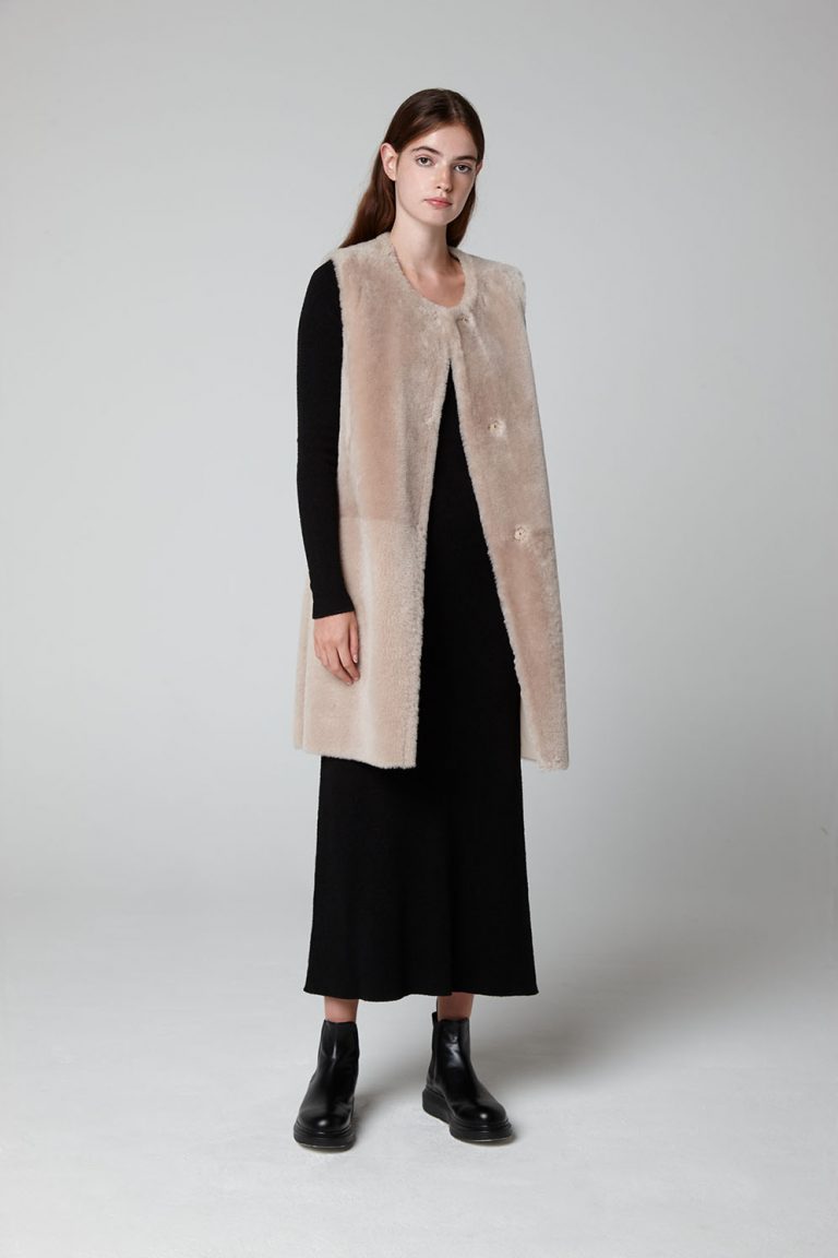 Ecru Long Side Split Shearling Gilet - model full length front - women | gushlow & cole
