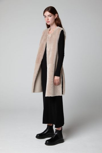 Ecru Long Side Split Shearling Gilet - model full length side - women | gushlow & cole