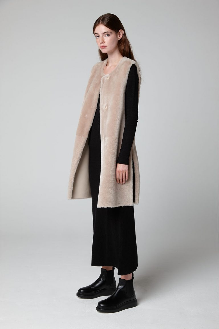 Ecru Long Side Split Shearling Gilet - model full length side - women | gushlow & cole