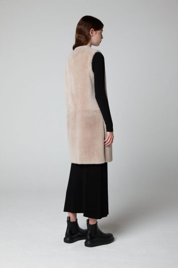 Ecru Long Side Split Shearling Gilet - model full length back - women | gushlow & cole