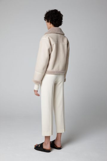 Ecru Shearling Aviator Jacket - model full length wool in back - women | gushlow & cole