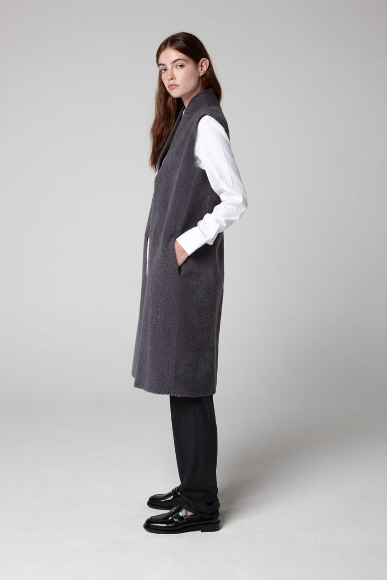 Grey Stand Collar Long Shearling Gilet - model full length side - women | gushlow & cole