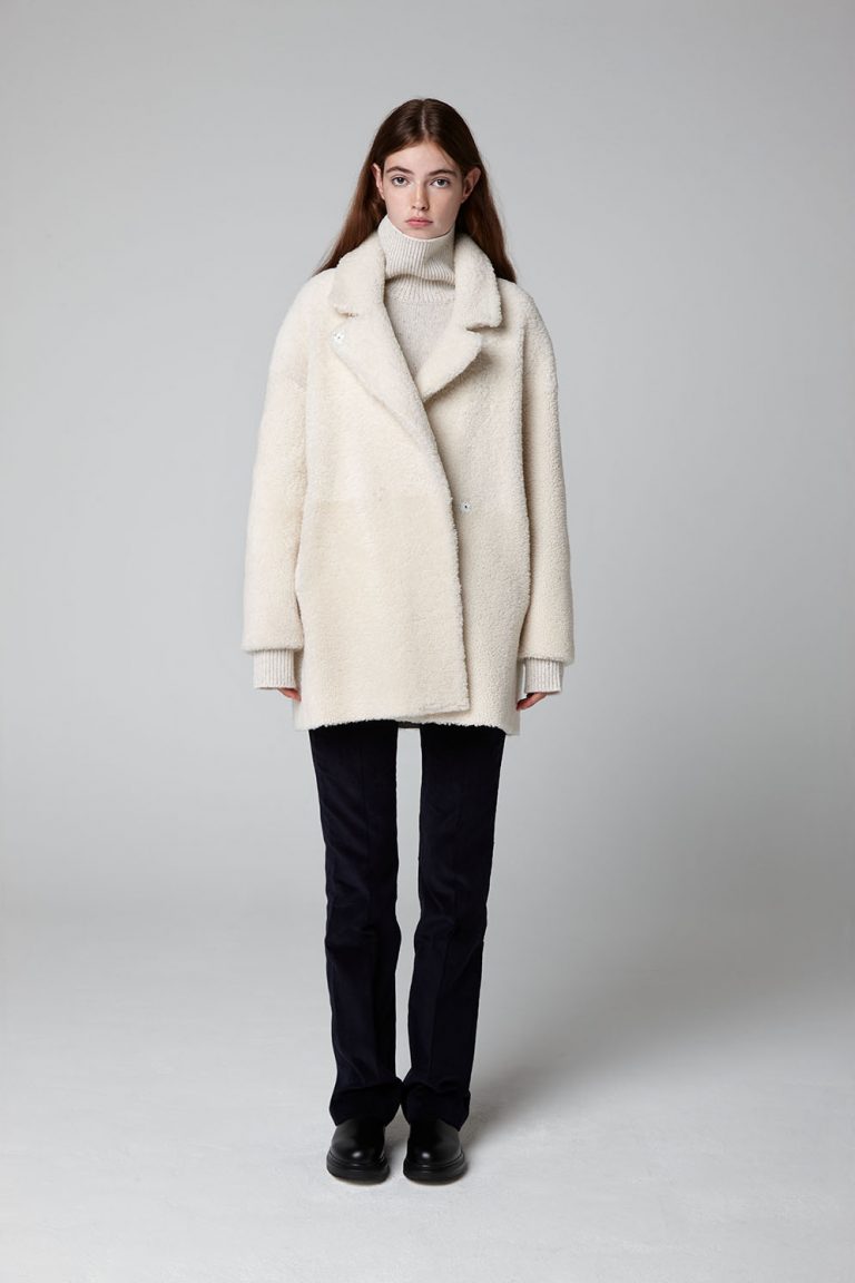 White Mid Length Shearling Overcoat - full length model closed - women | Gushlow & Cole