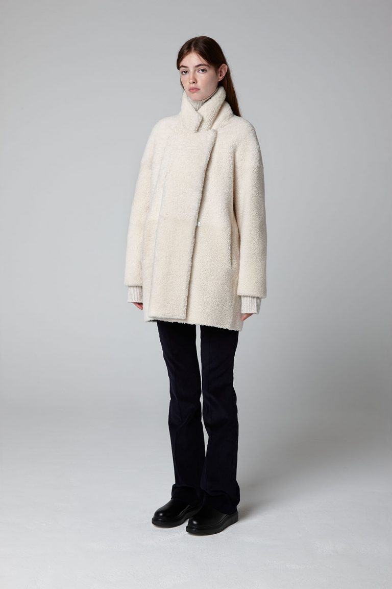 White Mid Length Shearling Overcoat - full length model done up - women | Gushlow & Cole