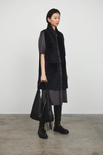 Graphite Black Stand Collar Shearling Gilet womens shearling model with bag