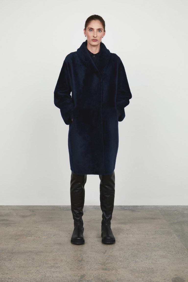 Navy Neat Shearling Shawl Coat women shearling model pockets front