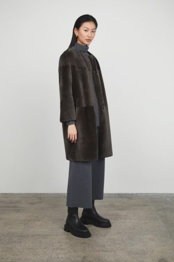 Storm Grey Collarless Shearling Coat gushlow and cole womens shearling model full length side angle