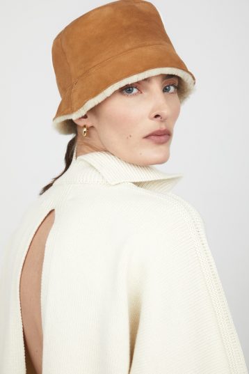 Tan & White Shearling Bucket Hat gushlow and cole - model portrait