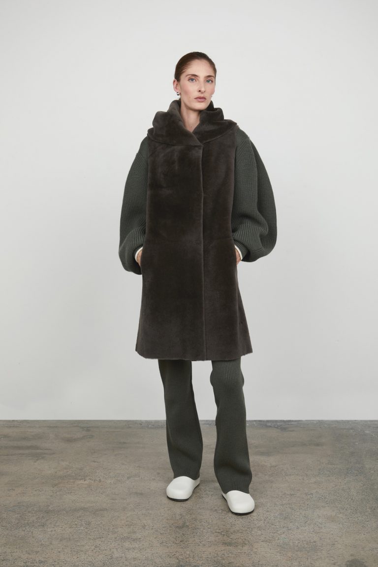 storm grey Longline Hooded Shearling Gilet gushlow and cole womens shearling model front pockets