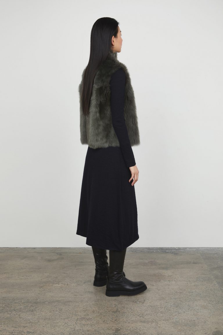 storm grey Natural Cut Shearling Gilet gushlow and cole womens shearling model back wool out