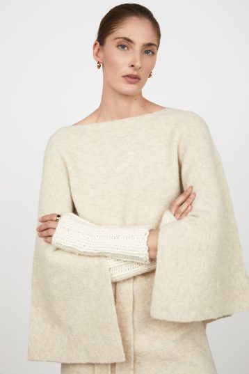 white Cable Knit Cuffs gushlow and cole womens shearling model hands crossed