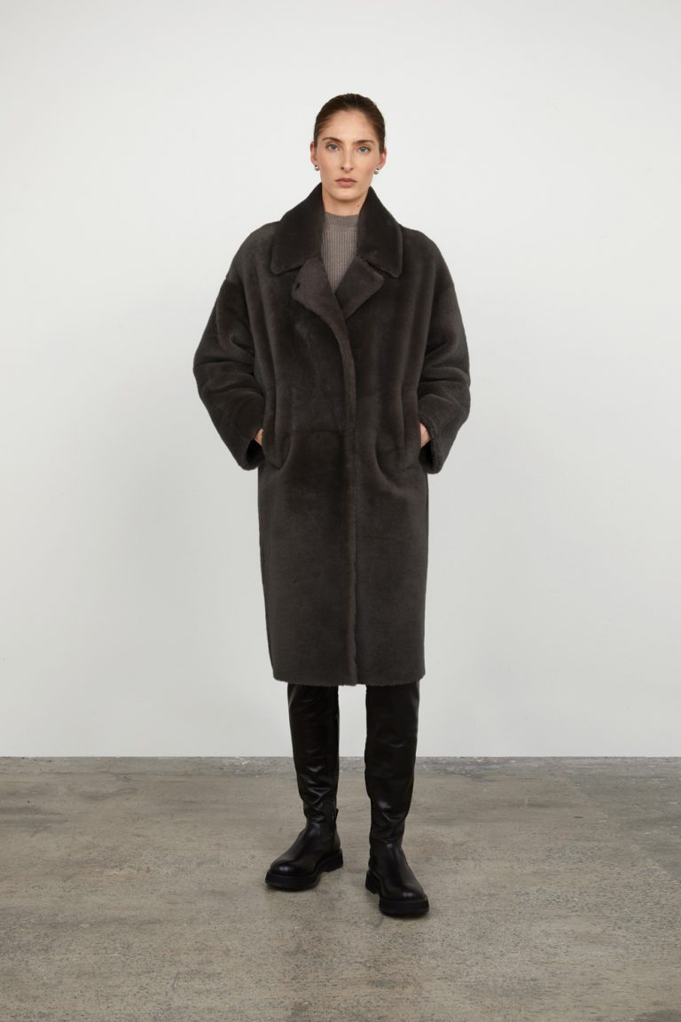 Storm Grey Notch Collar Shearling Coat gushlow and cole womens shearling model full length front hands in pocket