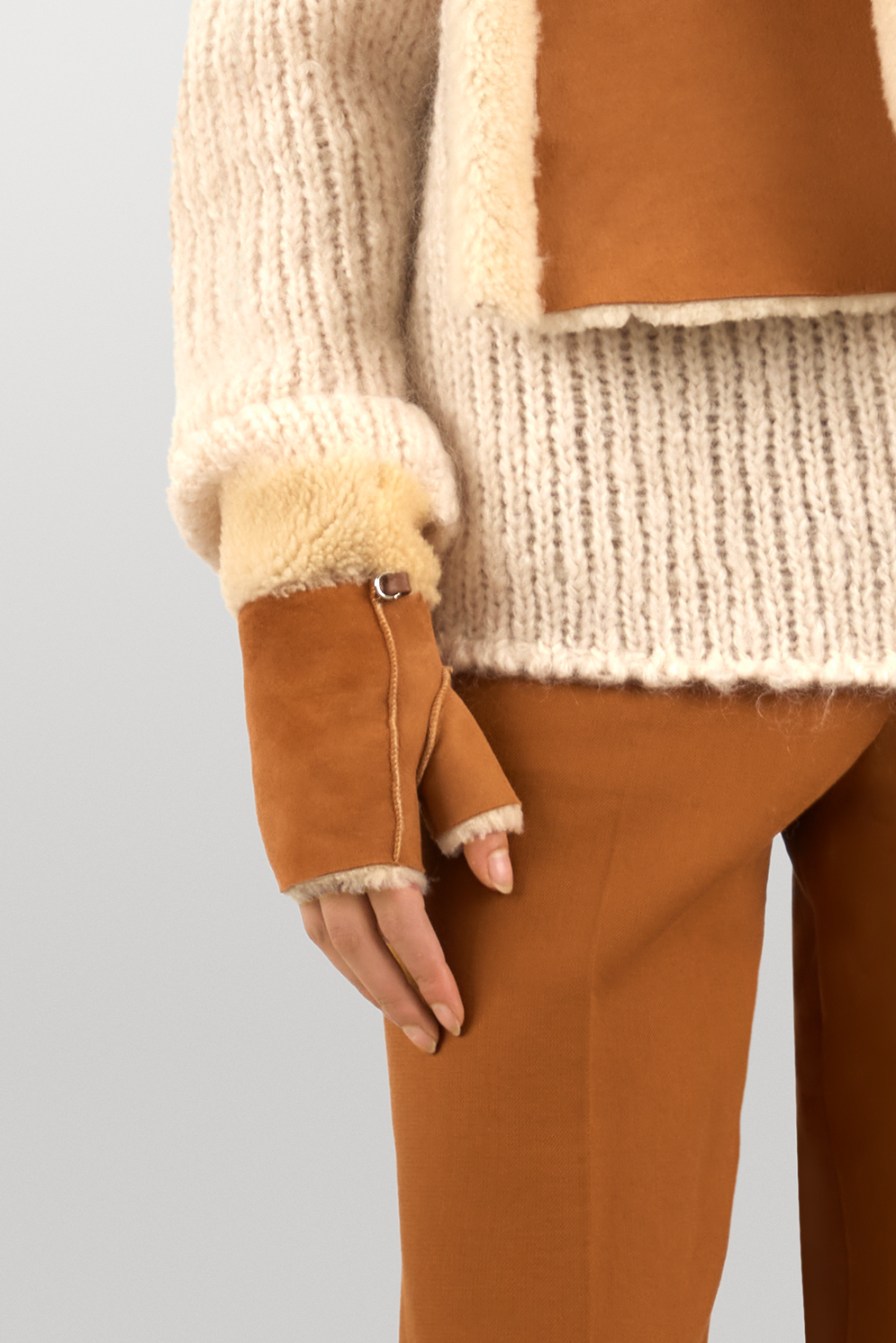 Tan and white cuffed Mini Shearling Mittens gushlow and cole womens model