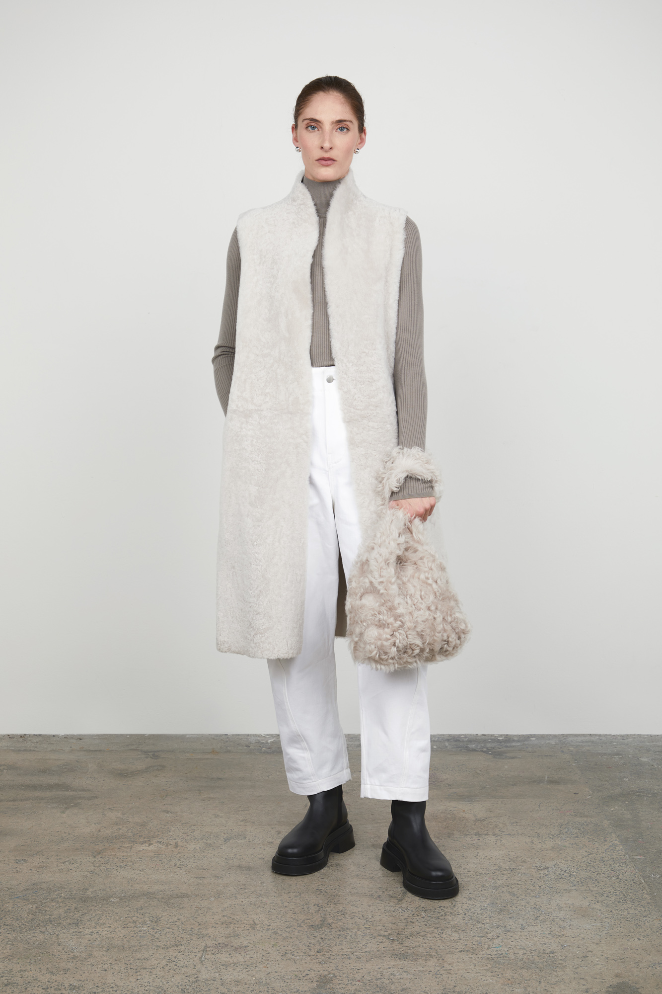 Oyster White Shearling Slouch Bag | Womens luxury shearling | Gushlow & Cole - full length model with bag